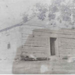 1800s photo of a log church
