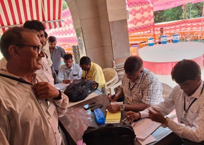 People registering at a table