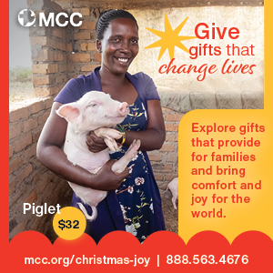 MCC: Give gifts that change lives. Explore gifts that provide for families and bring comfort and joy for the world. Imageis of a woman holding a piglet. 888-563-4676