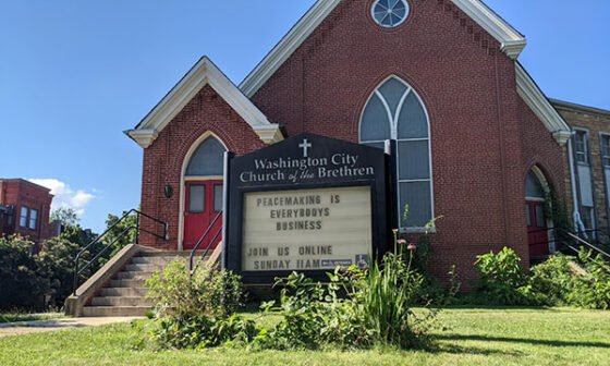 Washington City Church of the Brethren with sign that says "Peacemaking is everybody's business"