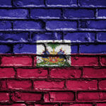 Haitian flag painted on bricks