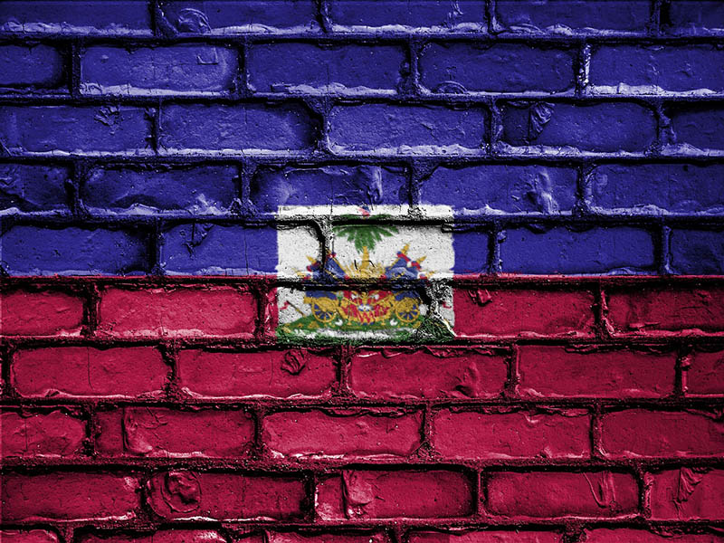 Haitian flag painted on bricks