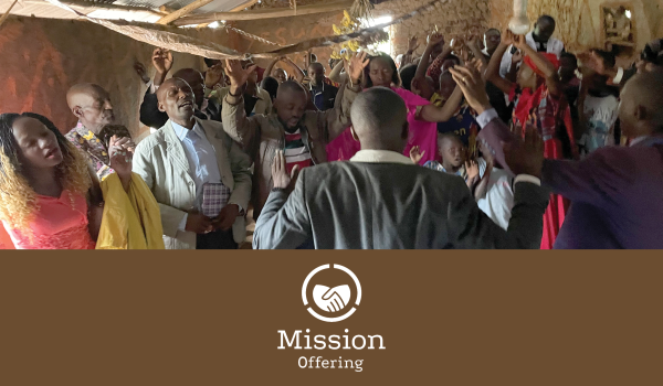 Mission Offering banner showing people worshipping