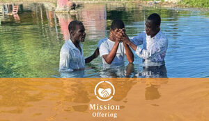Mission Offering with image of people being baptized outdoors in a body of water