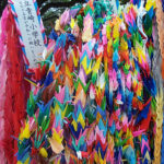 hundreds of colorful peace cranes