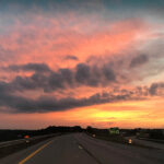 Colorful sky over a highway